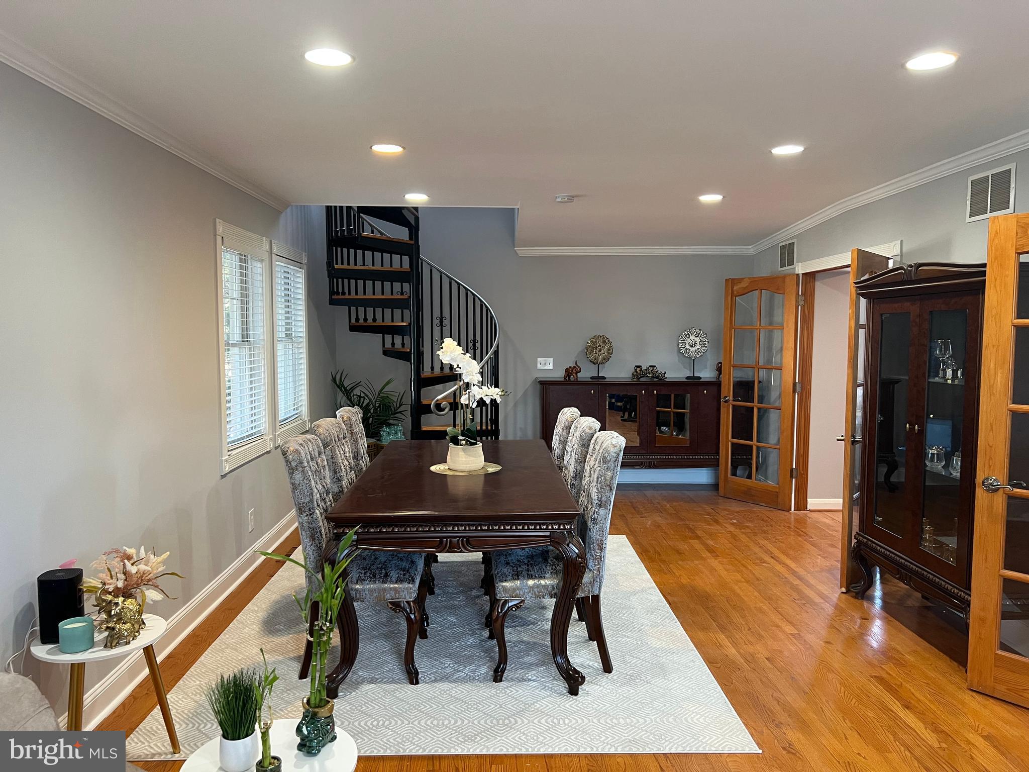 401 Imla Street Baltimore, MD 21224 - Photo 8 of 28 a view of a a dining room with furniture window and wooden floor