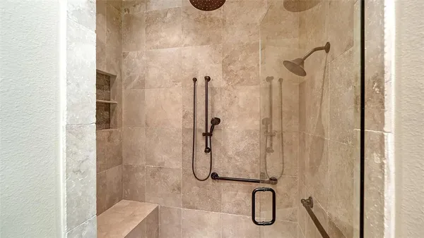 an aerial view of residential houses with outdoor space and swimming pool