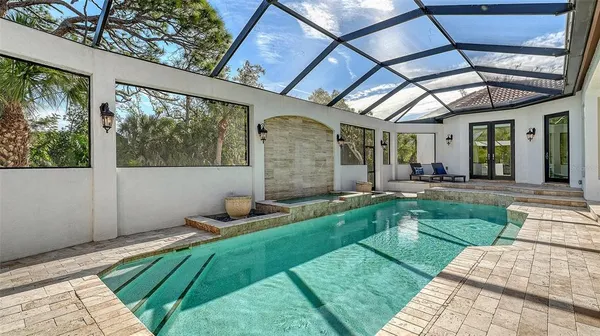 a view of small yard in front of house with a yard