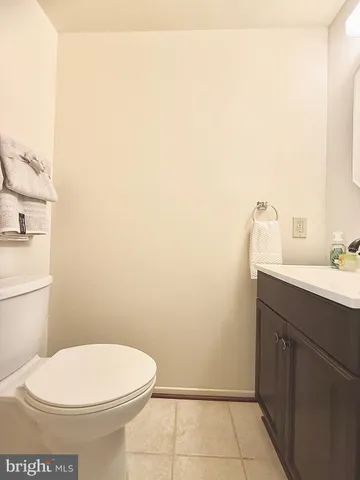 a swimming pool with outdoor seating and yard