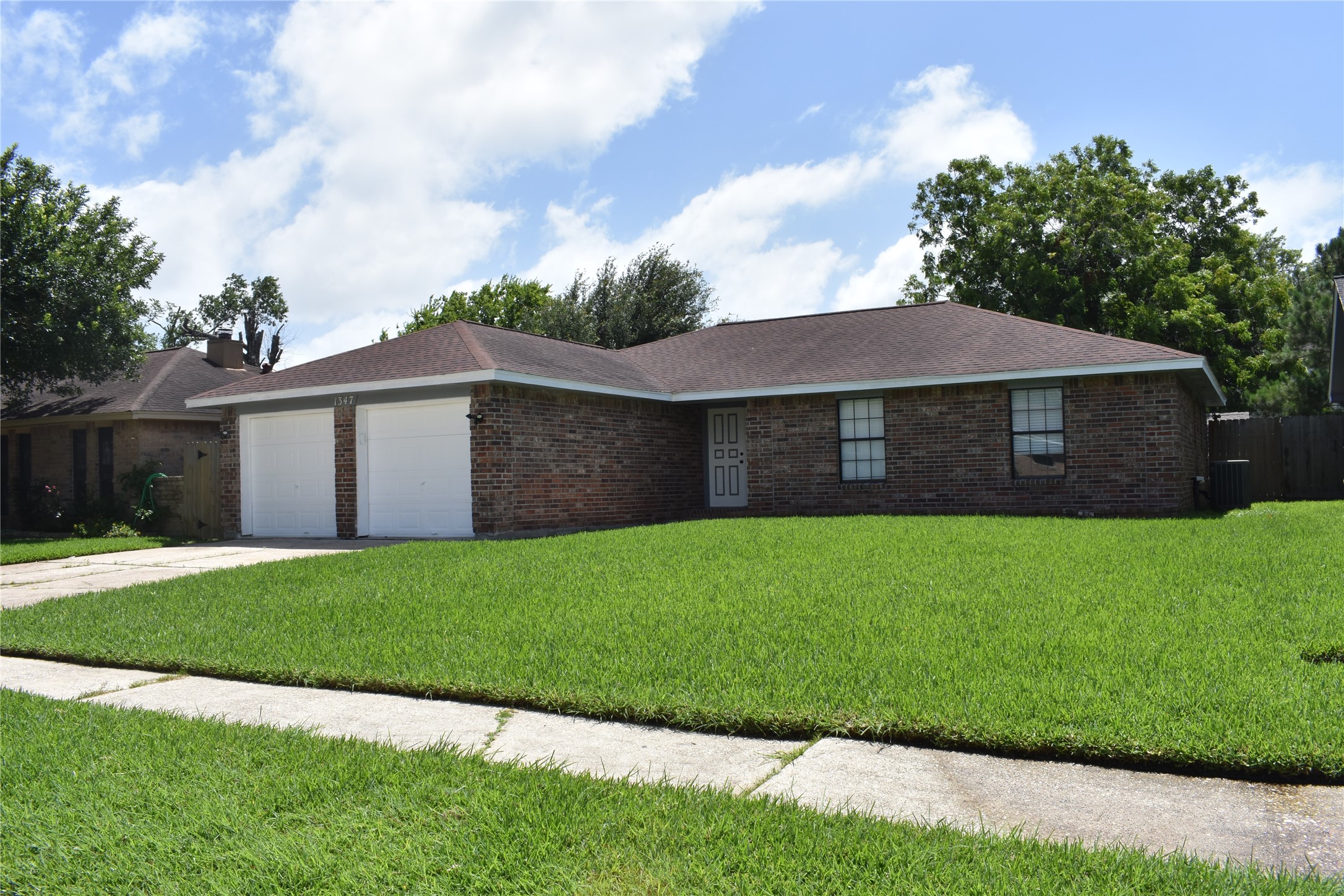 1347 Somercotes Lane Channelview, TX 77530 - Photo 2 of 30 a view of a house with a yard