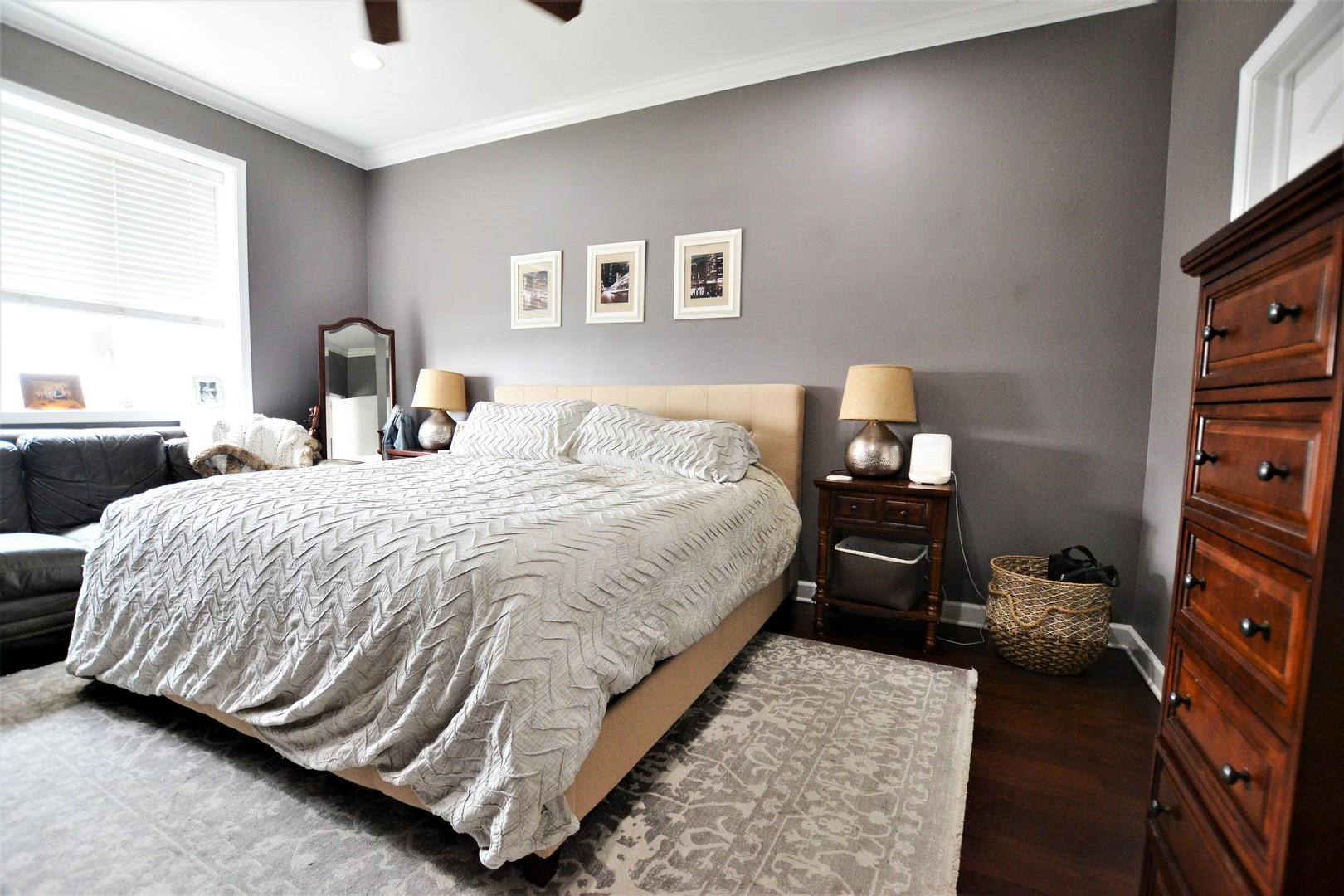 2900 West Irving Park Road, Unit 404 Chicago, IL 60618 - Photo 15 of 26 a bedroom with a bed and wooden floor