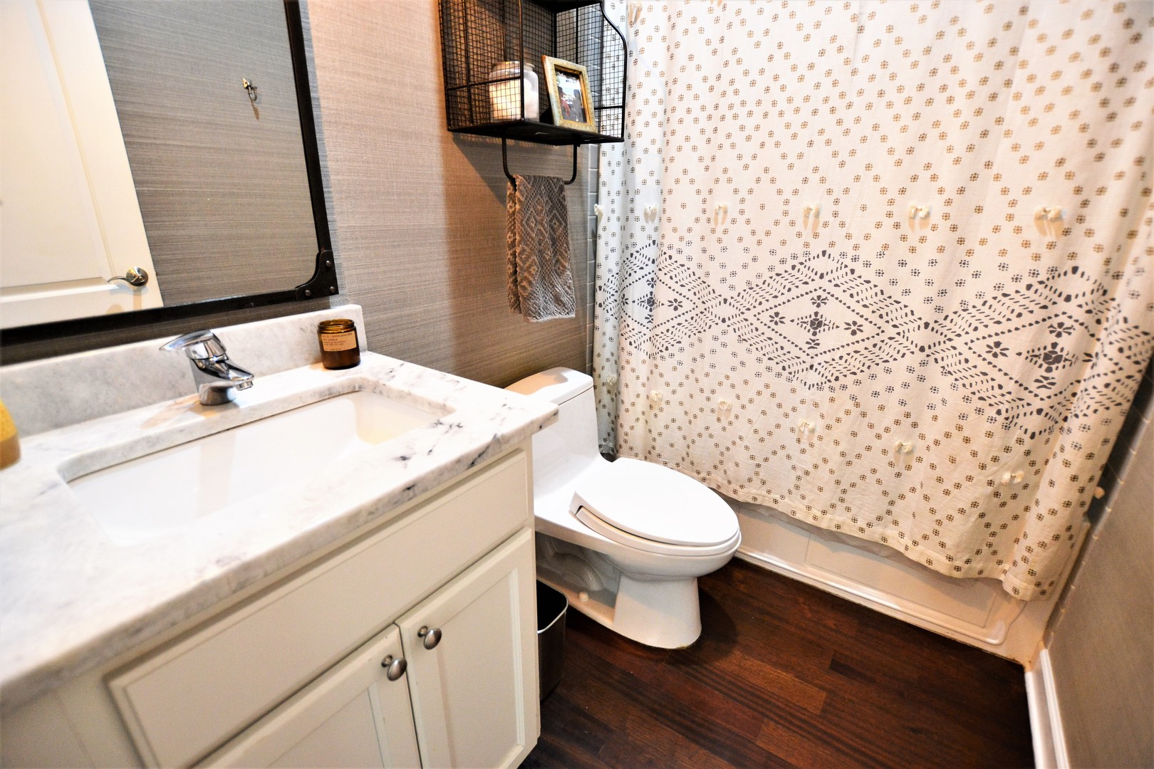 2900 West Irving Park Road, Unit 404 Chicago, IL 60618 - Photo 21 of 26 a bathroom with a sink toilet and shower