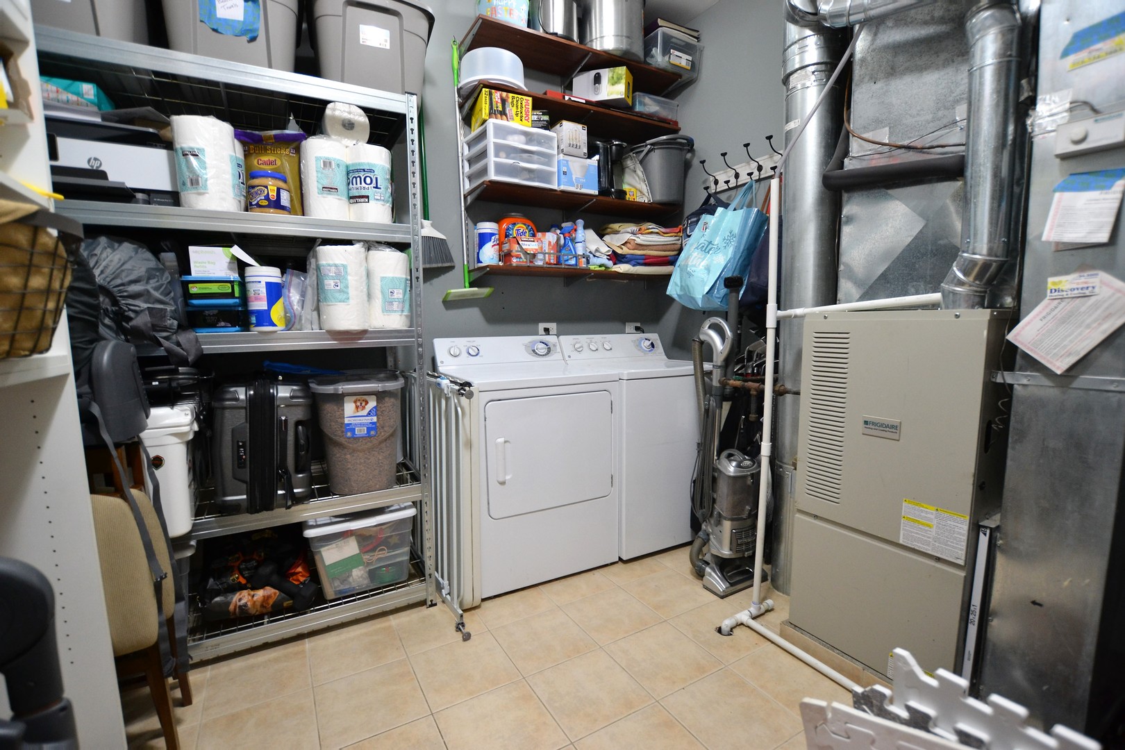 2900 West Irving Park Road, Unit 404 Chicago, IL 60618 - Photo 22 of 26 a view of walk in closet with clothes and shoes