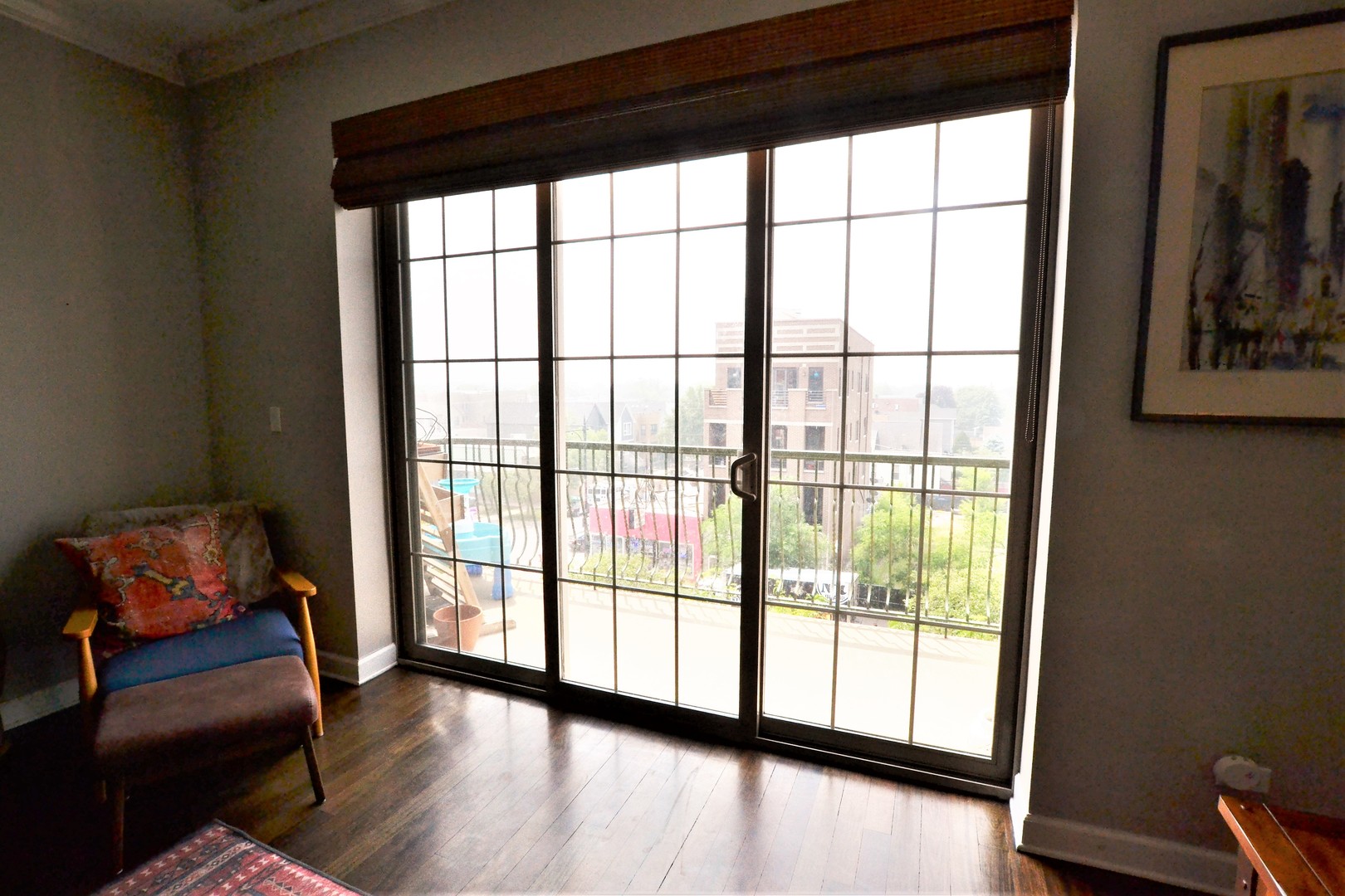 2900 West Irving Park Road, Unit 404 Chicago, IL 60618 - Photo 8 of 26 a living room with furniture and a large window