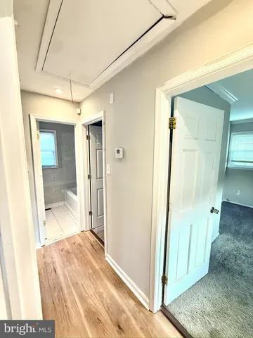 a bathroom with a shower and a tub