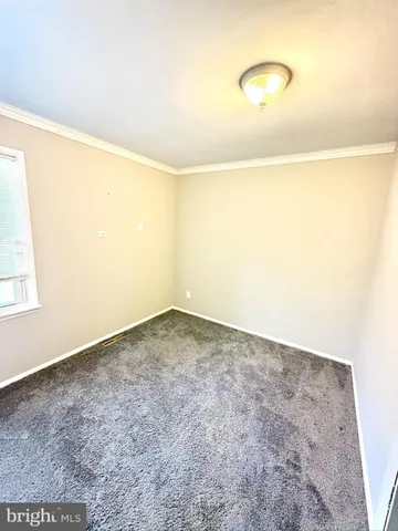 a view of a big room with wooden floor