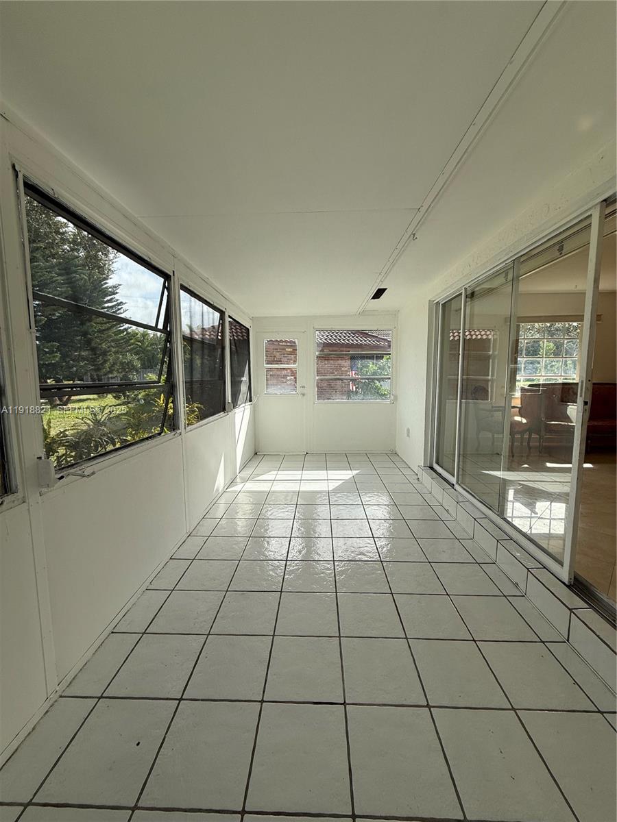 300 Northwest 42nd Street Boca Raton, FL 33431 - Photo 14 of 32 a view of an empty room and window