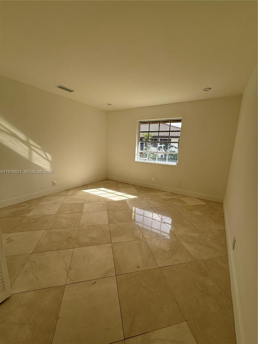 300 Northwest 42nd Street Boca Raton, FL 33431 - Photo 20 of 32 a view of an empty room and window