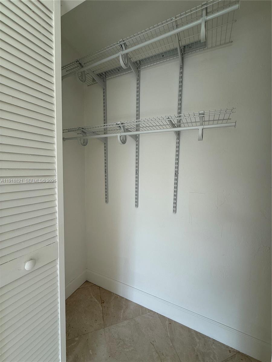 300 Northwest 42nd Street Boca Raton, FL 33431 - Photo 21 of 32 a view of a room with racks on the wall