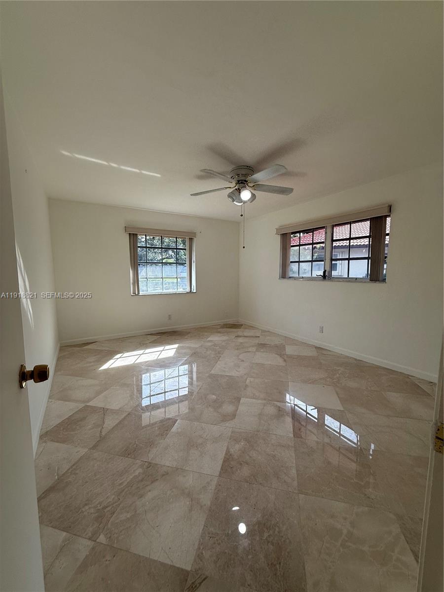 300 Northwest 42nd Street Boca Raton, FL 33431 - Photo 24 of 32 a view of an empty room with a window