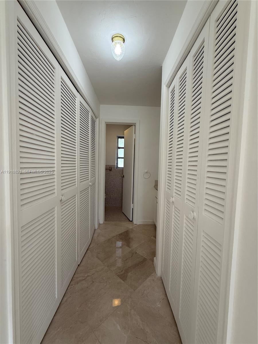 300 Northwest 42nd Street Boca Raton, FL 33431 - Photo 26 of 32 an entryway with a workspace