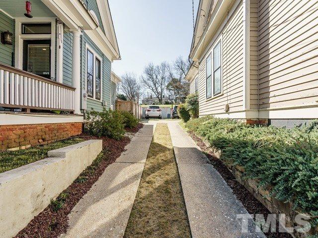 518 East Lane Street Raleigh, NC 27601 - Photo 20 of 29 a view of a pathway with a house