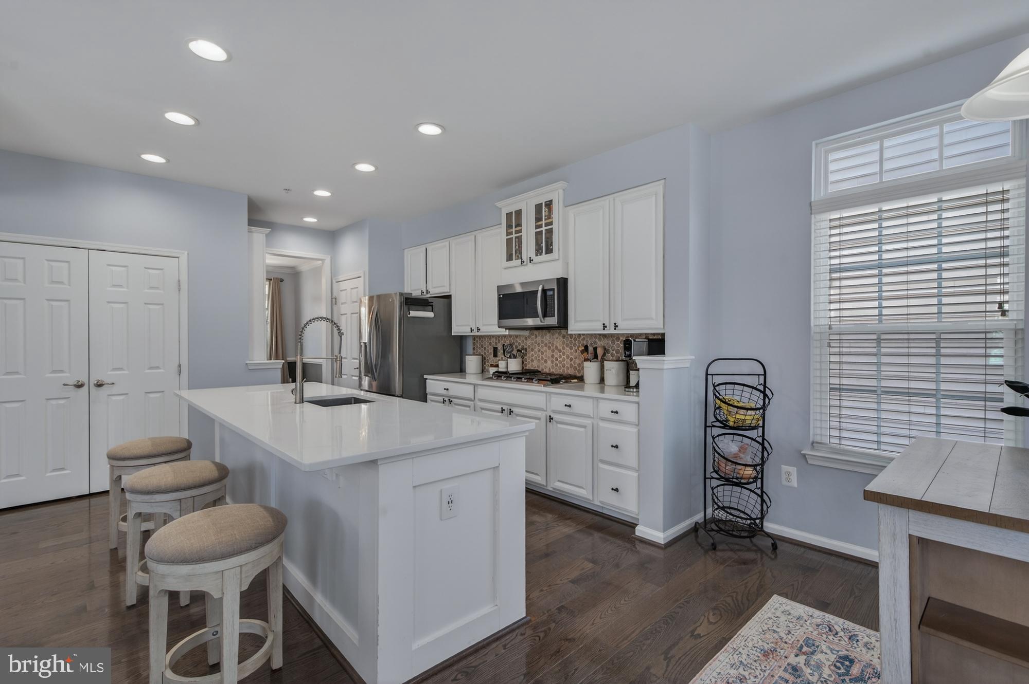 1317 Yourtee Spring Drive Brunswick, MD 21716 - Photo 11 of 73 a kitchen with appliances cabinets and furniture
