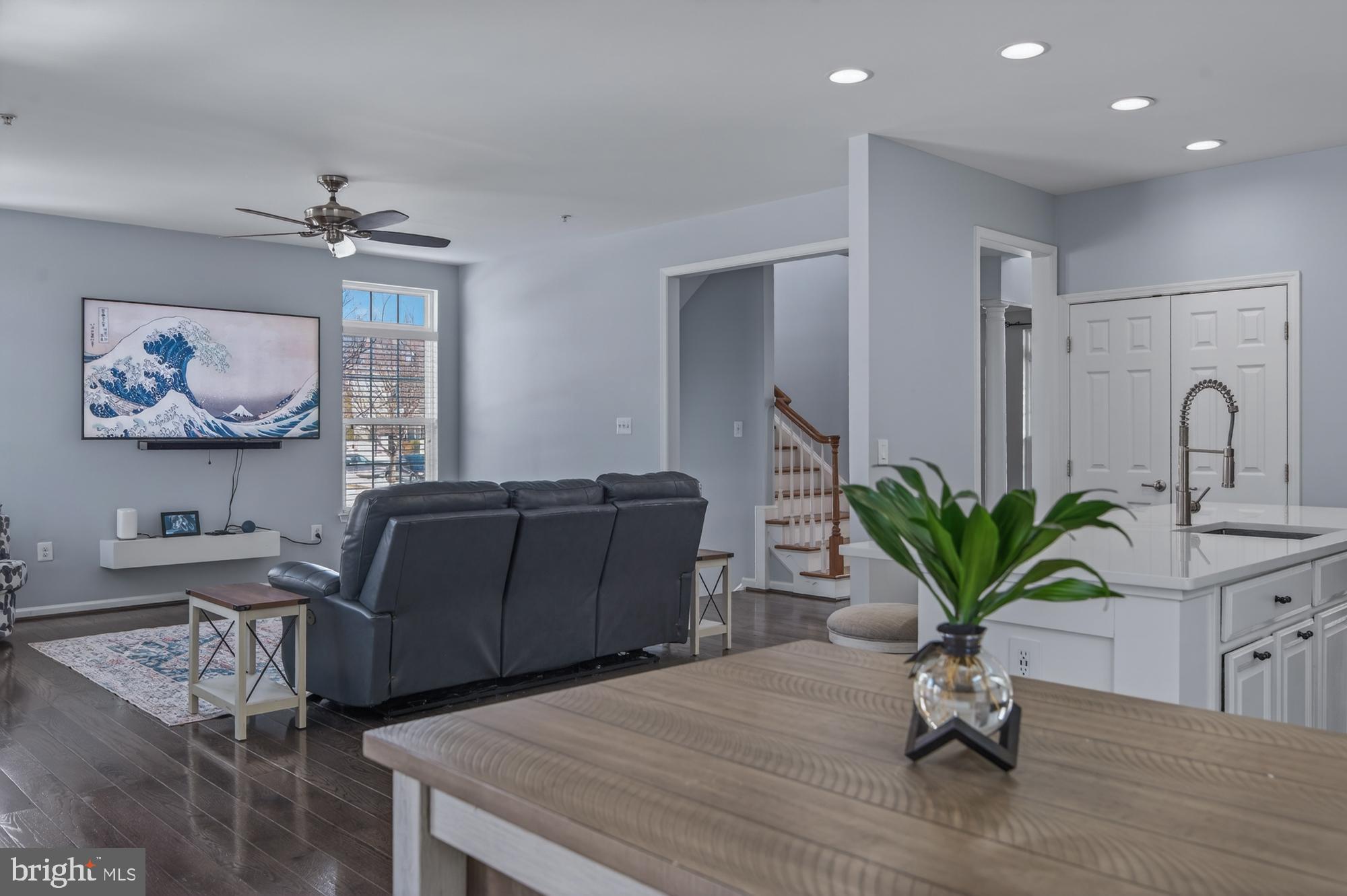1317 Yourtee Spring Drive Brunswick, MD 21716 - Photo 15 of 73 a living room with furniture potted plant and a window