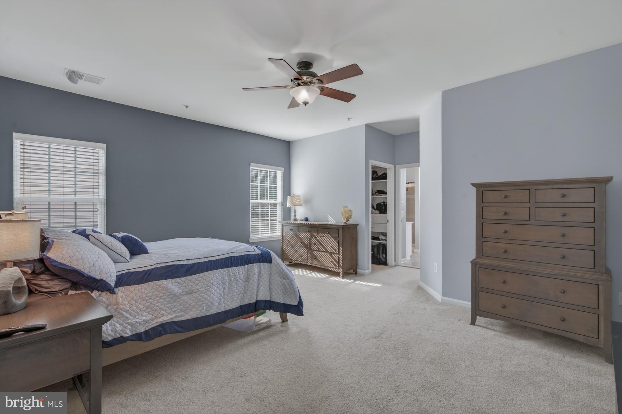 1317 Yourtee Spring Drive Brunswick, MD 21716 - Photo 29 of 73 a spacious bedroom with a bed and furniture