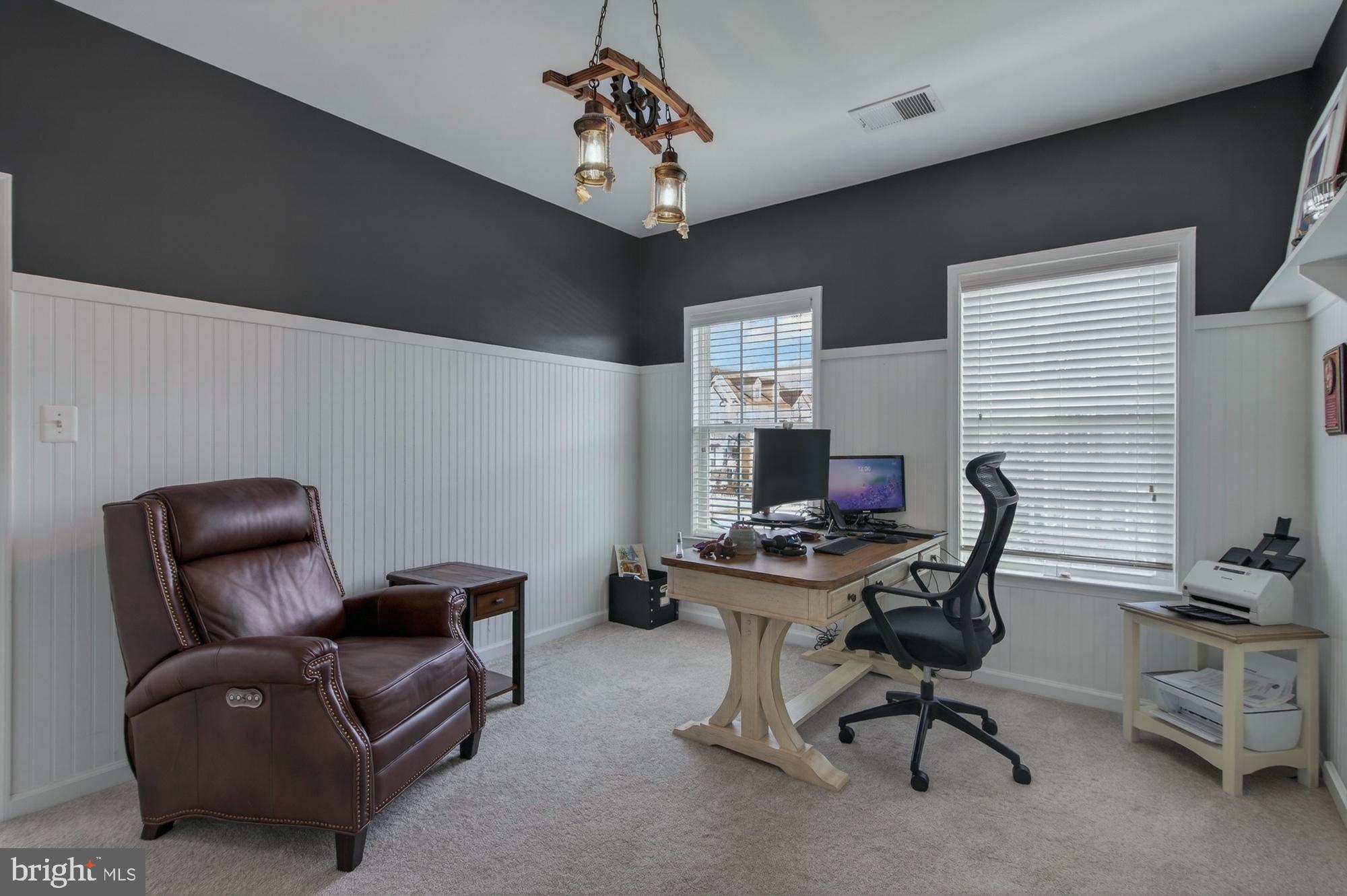 1317 Yourtee Spring Drive Brunswick, MD 21716 - Photo 34 of 73 a work room with furniture and a ceiling fan
