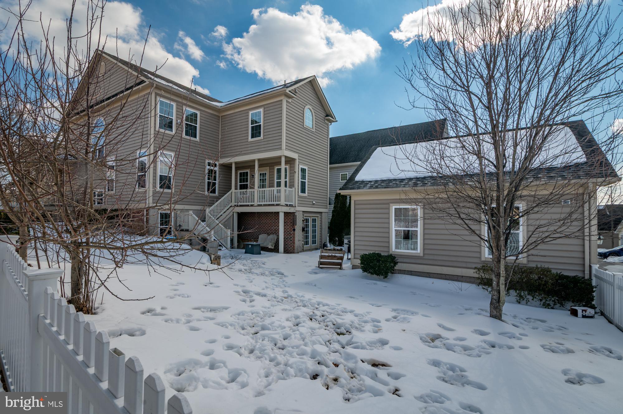 1317 Yourtee Spring Drive Brunswick, MD 21716 - Photo 54 of 73 a view of a house with a yard and sitting area