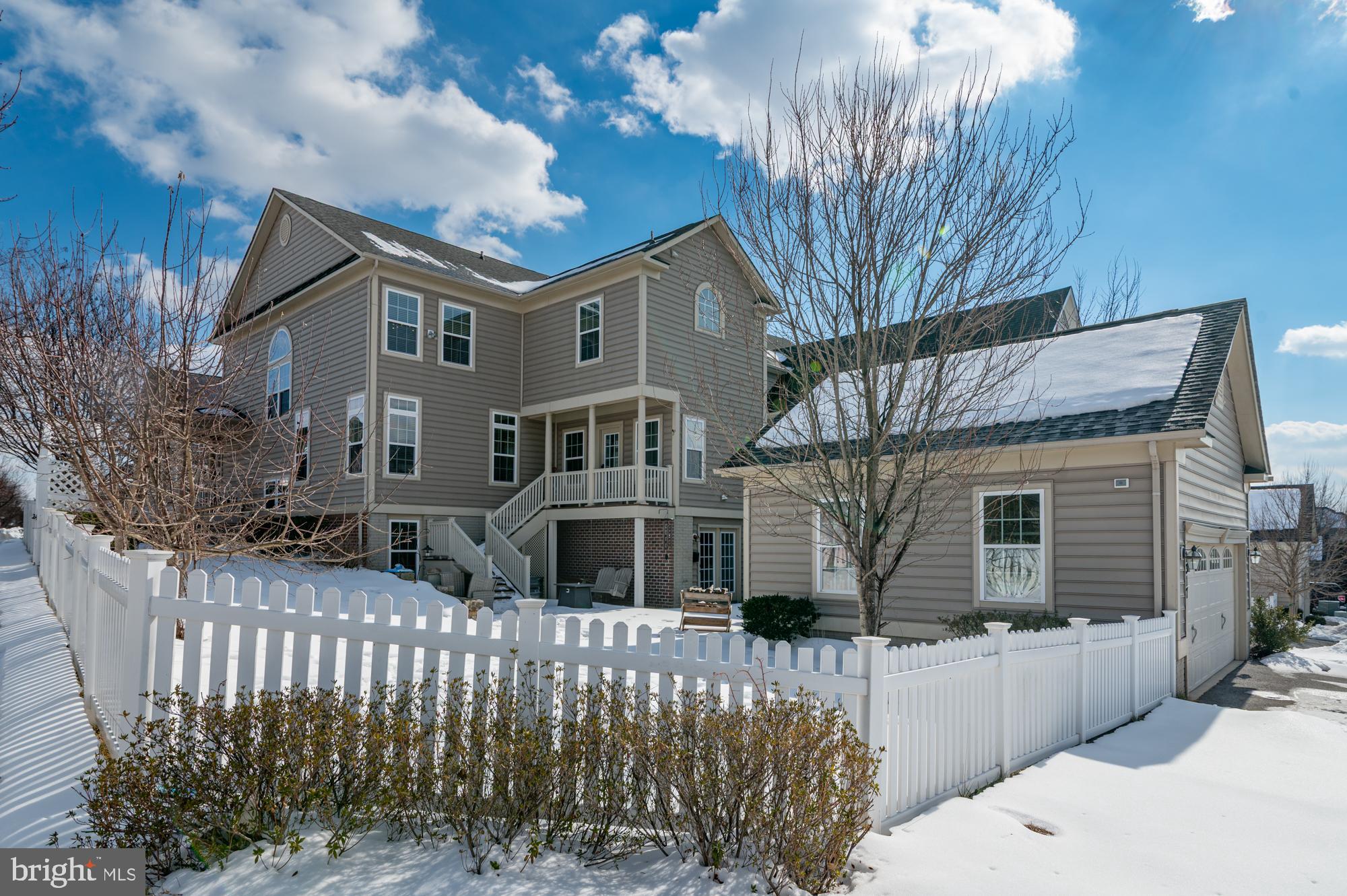 1317 Yourtee Spring Drive Brunswick, MD 21716 - Photo 55 of 73 a front view of house with yard outdoor seating and barbeque oven