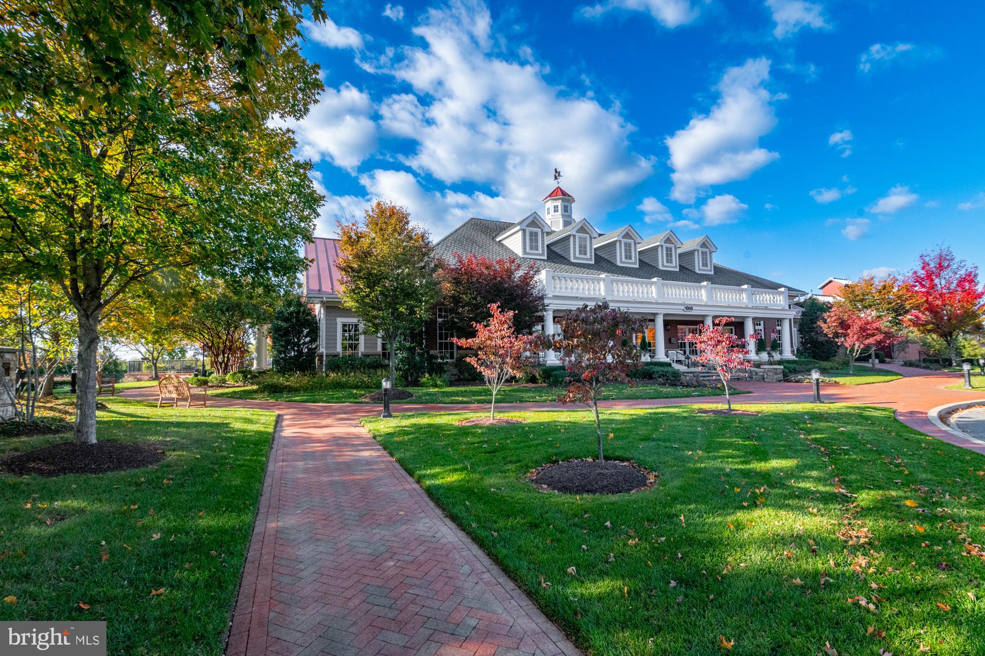 1317 Yourtee Spring Drive Brunswick, MD 21716 - Photo 58 of 73 a front view of a building with garden