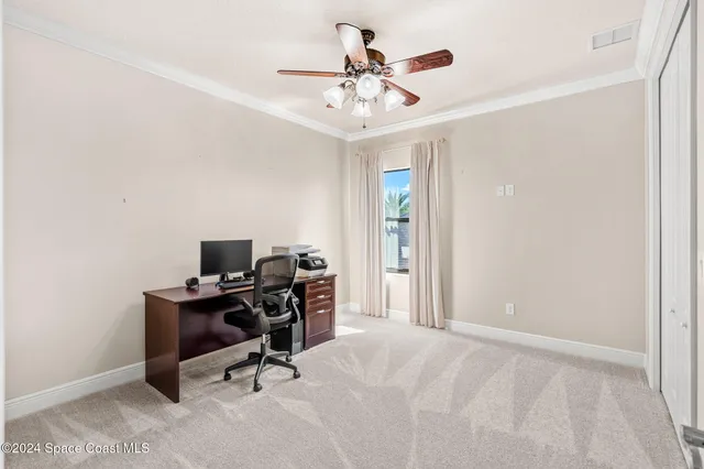 a bathroom with a granite countertop sink toilet a mirror a shower and a