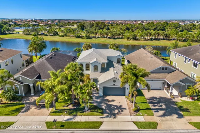 a view of a lake with a yard