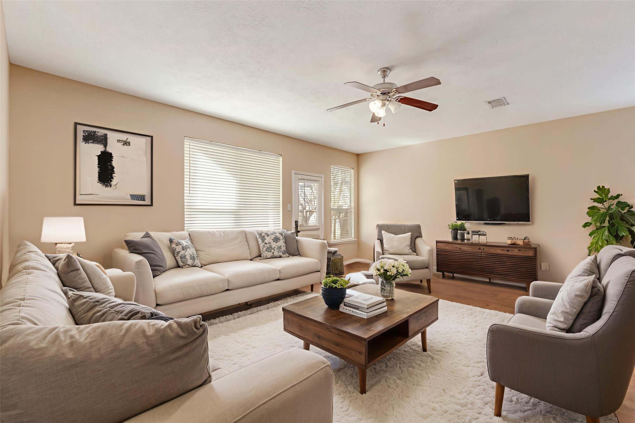 914 Chapwood Court Spring, TX 77373 - Photo 3 of 22 a living room with furniture and a flat screen tv