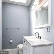 a view of a room that has a window