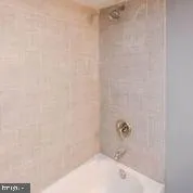 a view of a balcony with wooden floor