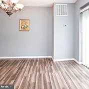 a kitchen with stainless steel appliances a stove a microwave and cabinets