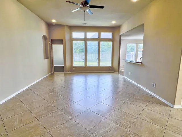 a kitchen with granite countertop a stove and a sink