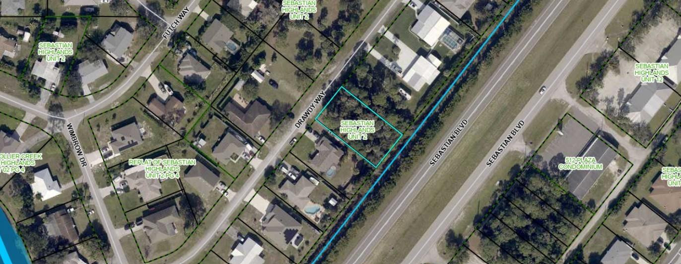 557 Drawdy Way Sebastian, FL 32958 - Photo 2 of 6 a picture of a building