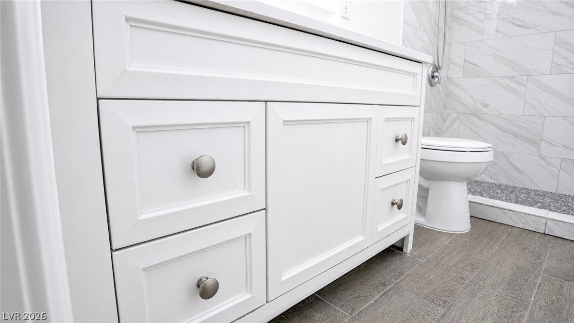 2870 South Sandhill Road Las Vegas, NV 89121 - Photo 51 of 64 Clean lines and a spacious vanity complement this well-appointed bath.