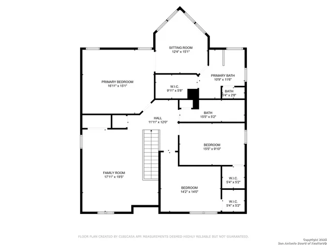 a view of a street with houses on both side