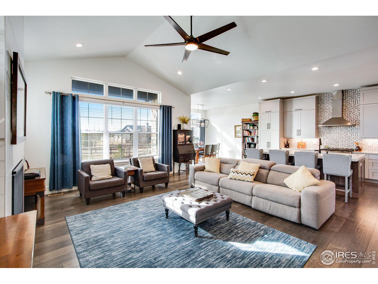 6278 Foundry Court Timnath, CO 80547 - Photo 19 of 40 a living room with furniture and a large window