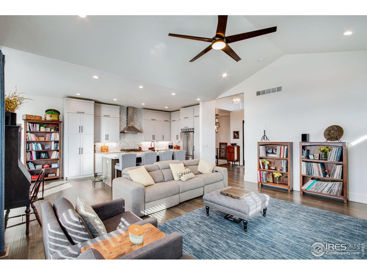 6278 Foundry Court Timnath, CO 80547 - Photo 20 of 40 a living room with furniture and wooden floor