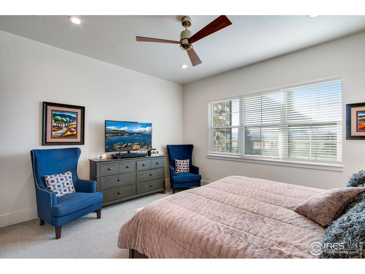 6278 Foundry Court Timnath, CO 80547 - Photo 25 of 40 a bedroom with furniture and a window