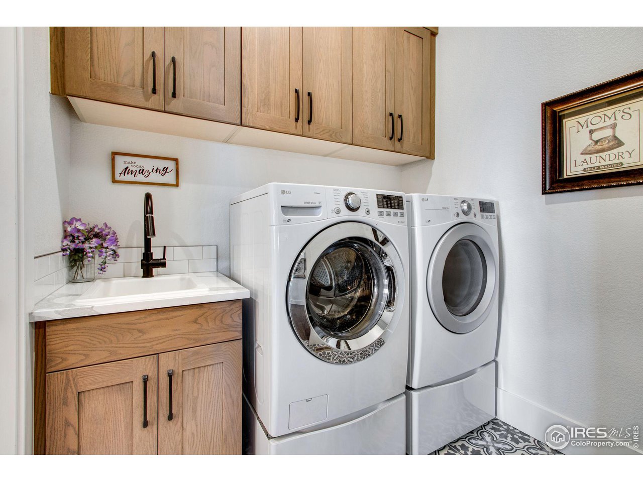 6278 Foundry Court Timnath, CO 80547 - Photo 26 of 40 a kitchen with kitchen island sink stove and cabinets
