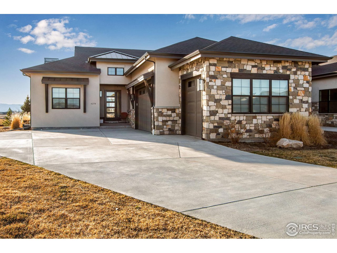 6278 Foundry Court Timnath, CO 80547 - Photo 3 of 40 a view of a house with a outdoor space