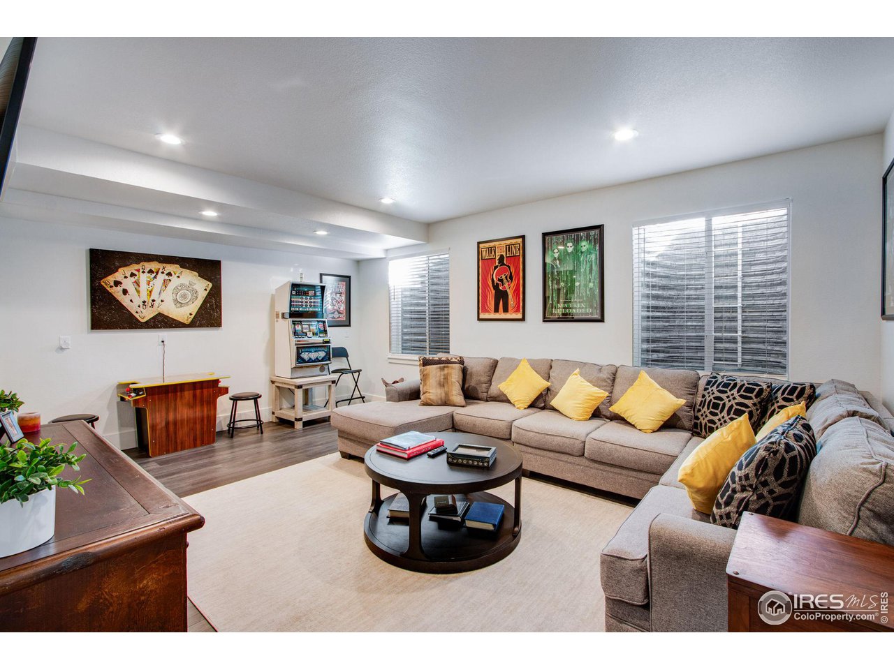 6278 Foundry Court Timnath, CO 80547 - Photo 32 of 40 a living room with furniture and a large window