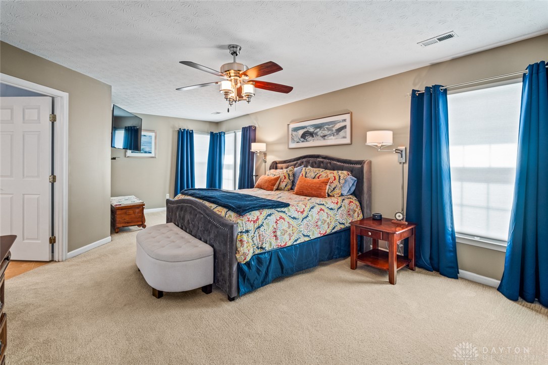 55 Janney Lane Springboro, OH 45066 - Photo 25 of 38 This spacious bedroom offers ample comfort and natural light.