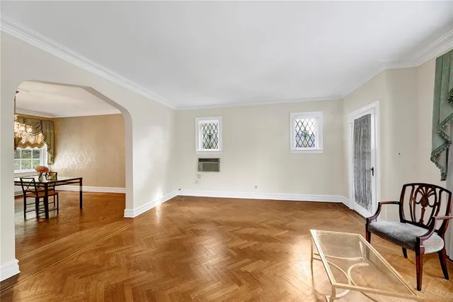 a view of a livingroom with furniture and windows