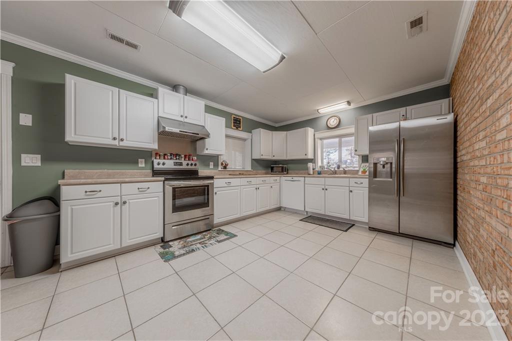 10672 Barberville Road Indian Land, SC 29707 - Photo 11 of 22 a kitchen with cabinets and steel stainless steel appliances