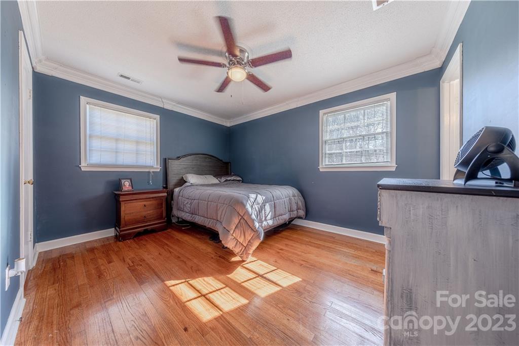 10672 Barberville Road Indian Land, SC 29707 - Photo 12 of 22 a bedroom with a bed and a window