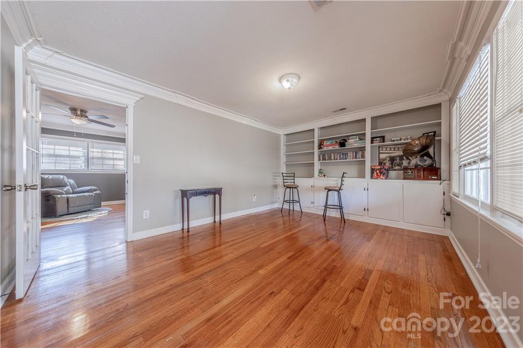 10672 Barberville Road Indian Land, SC 29707 - Photo 2 of 22 a view of a livingroom with wooden floor