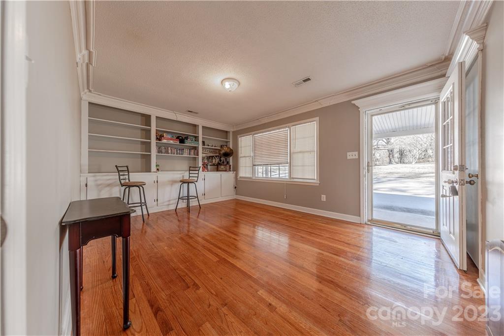 10672 Barberville Road Indian Land, SC 29707 - Photo 3 of 22 wooden floor in an empty room with a window