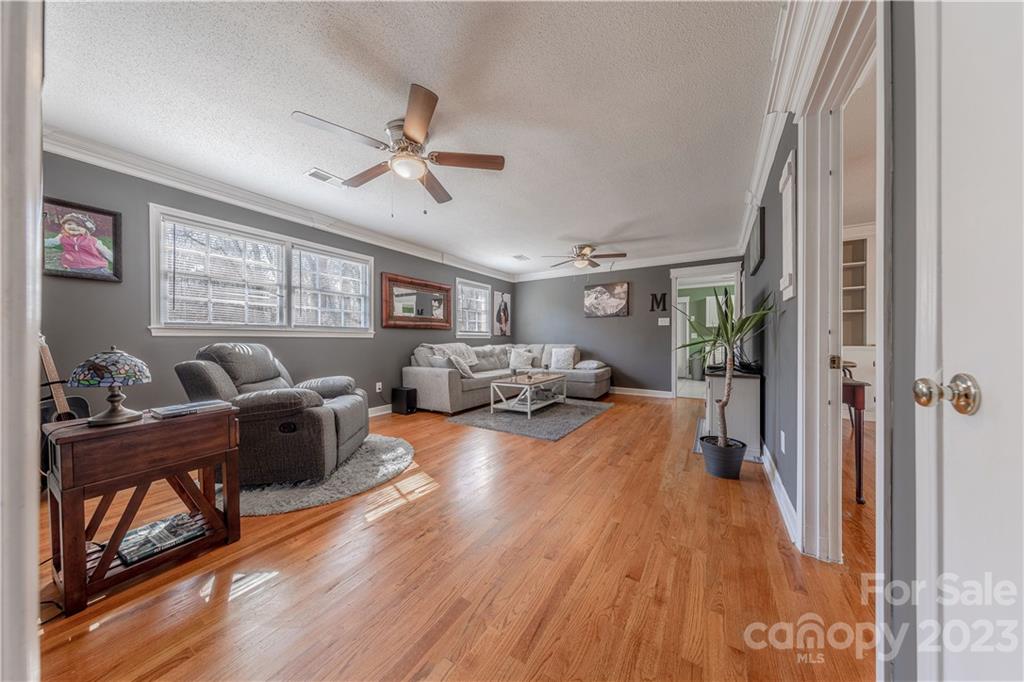 10672 Barberville Road Indian Land, SC 29707 - Photo 7 of 22 a living room with furniture and a wooden floor