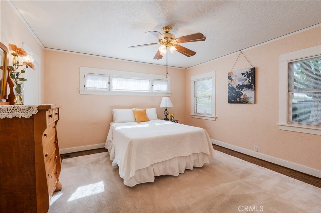 405 North Janss Street Anaheim, CA 92805 - Photo 16 of 33 a bedroom with a bed and a chandelier