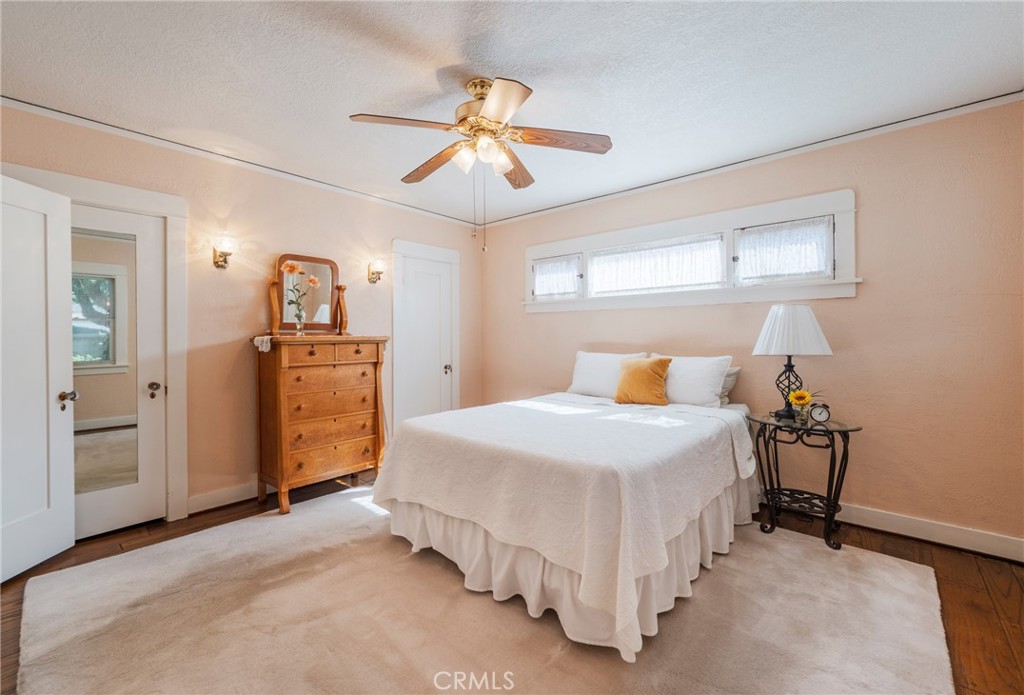 405 North Janss Street Anaheim, CA 92805 - Photo 17 of 33 a bedroom with a bed and a chandelier