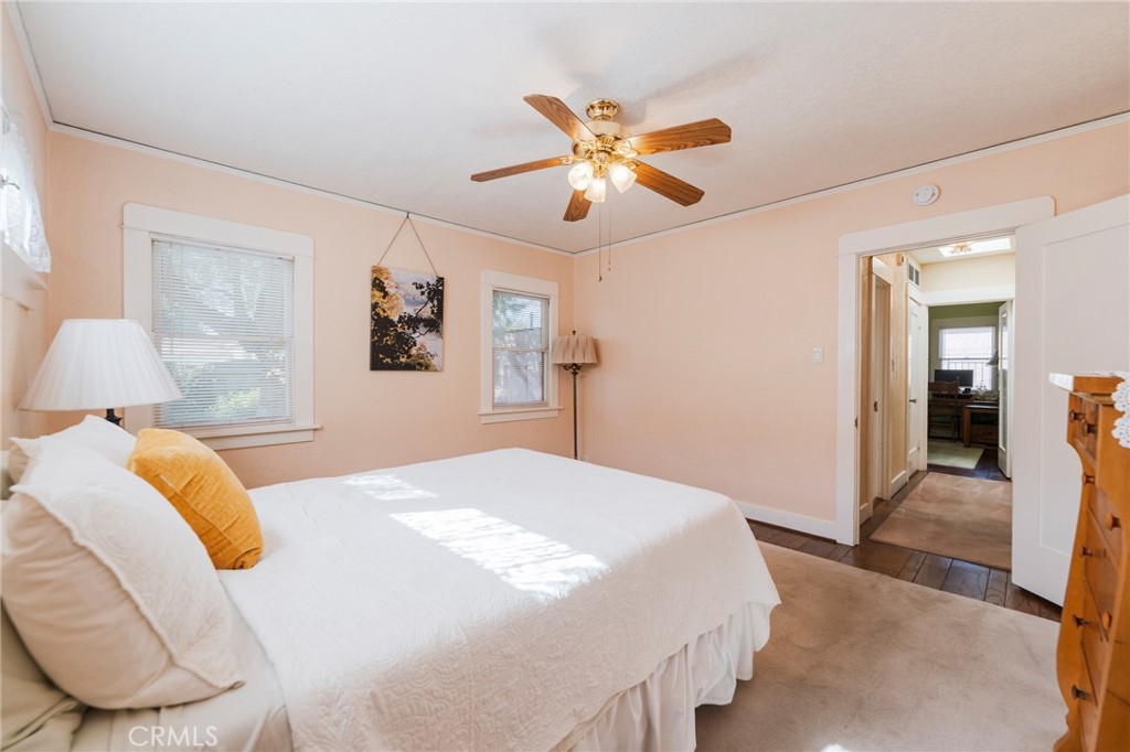 405 North Janss Street Anaheim, CA 92805 - Photo 18 of 33 a bedroom with a large bed and a chandelier